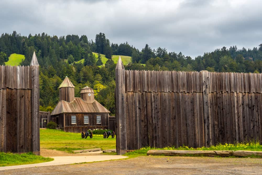 Wooden fence and wooden fortified building at Fort Ross near Jenner