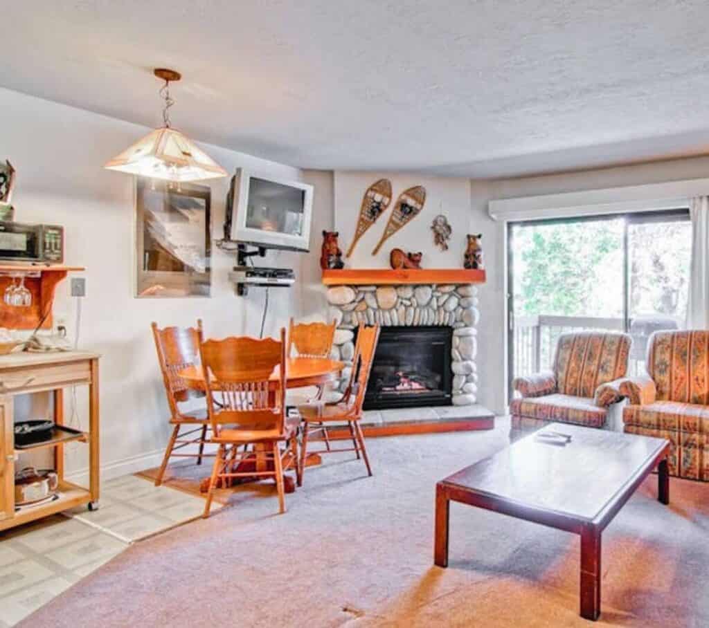 Fireplace with small dining table and chairs