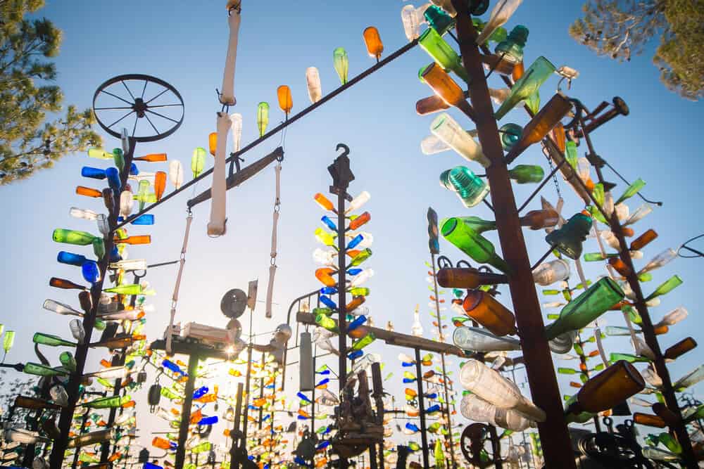 Art installation with collected beer bottles and other glass bottles at Elmer's Bottle Tree Ranch, San Bernardino, California, between Los Angeles and Vegas.