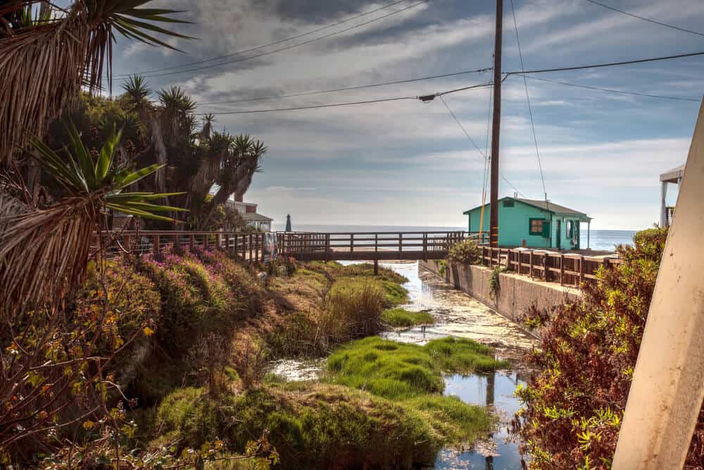 Bridge and Beach cottages line Crystal Cove State Park beach and are right on the sand with an ocean view in Newport Beach, California