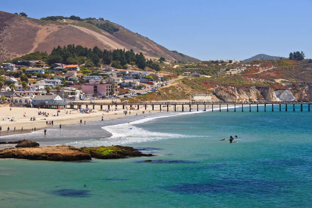 the beautiful turquoise waters of the Pacific Ocean at Avila beach with a pier