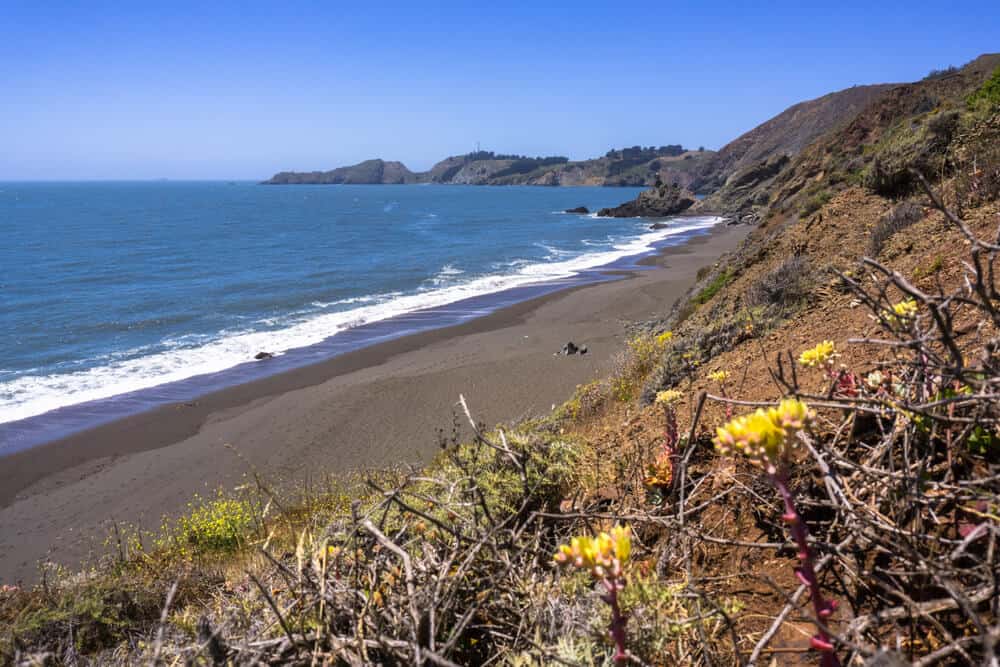 A black sand beach in the Marin Headlands near San Francisco: date idea for those who love the water!