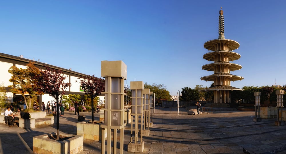 Four-tiered circular Peace Pagoda in a public park in San Francisco, filled with other architectural and sculptural pieces.