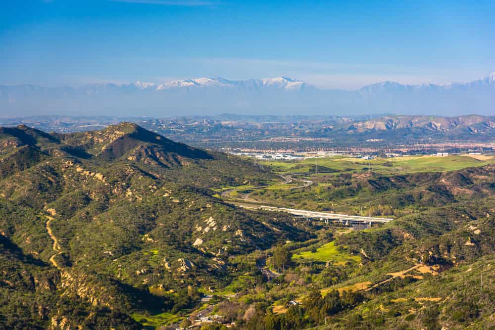 the mountains of laguna beach and city in the distance from this popular laguna beach hike