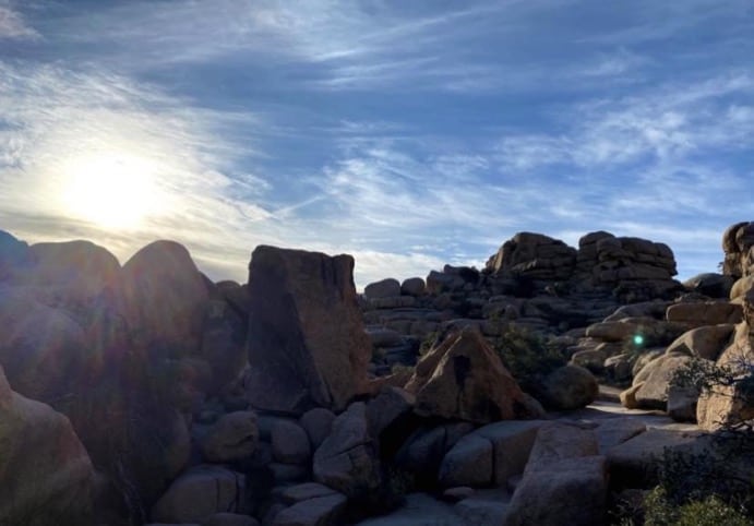 Craggy rocks in the desert landscape in the late afternoon sun hiking in Joshua Tree National Park