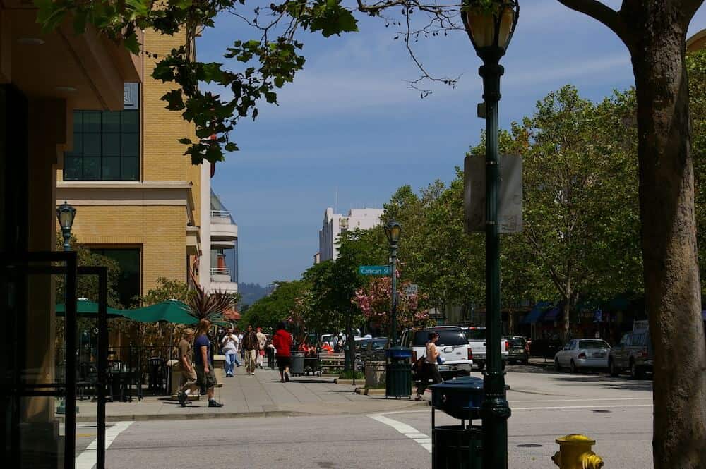 People walking on Pacific Avenue in downtown Santa Cruz