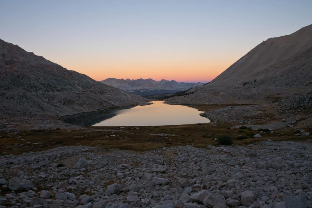 sunset over guitar lake with a little lake at sunset