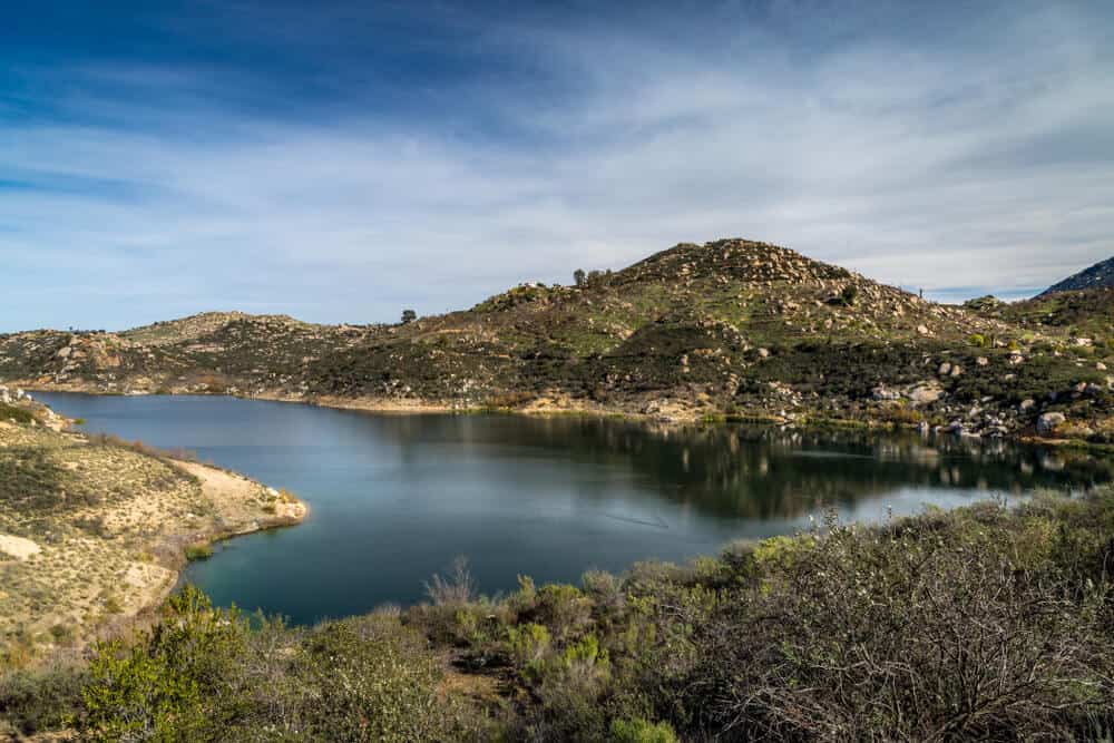 Beautiful Lake Ramona surrounded by mountains in an elevated location seen from the Green Valley Truck Trail, Blue Sky Ecological Reserve