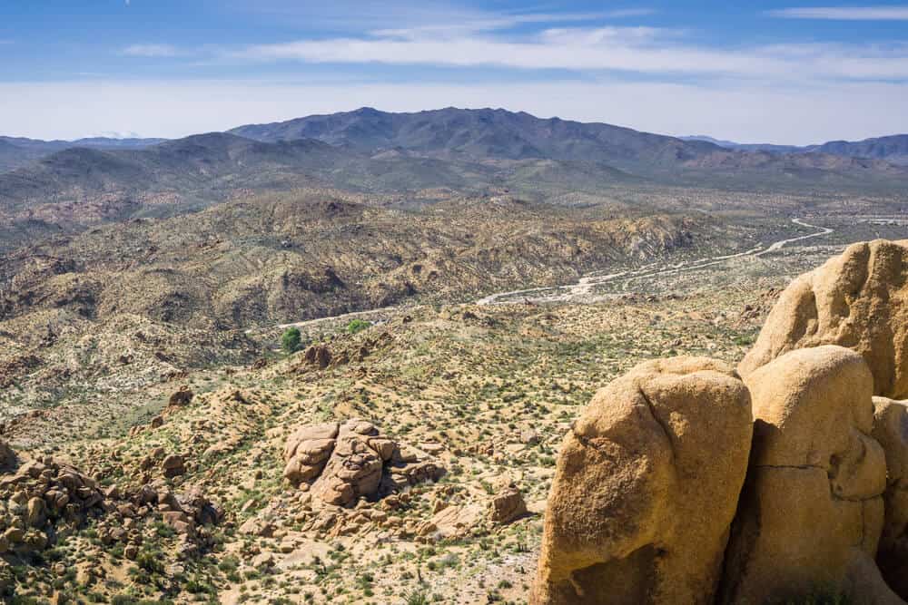 the rocks at mastodon peak with mountains in the distance