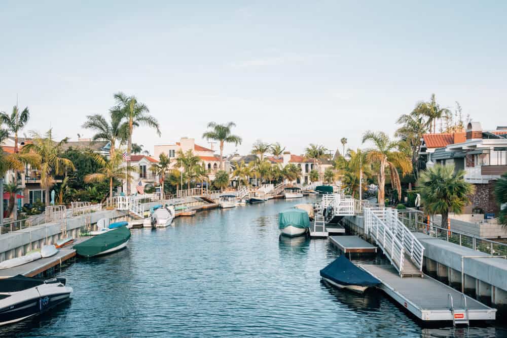 the naples region of long beach with canals boats and trees