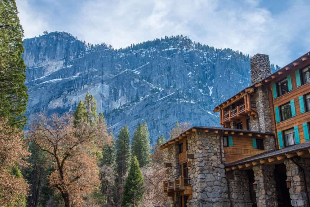 photo of the famous ahwahnee hotel in yosemite with trees