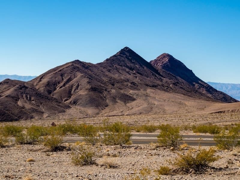 the road by corkscrew mountain for exploring corkscrew canyon