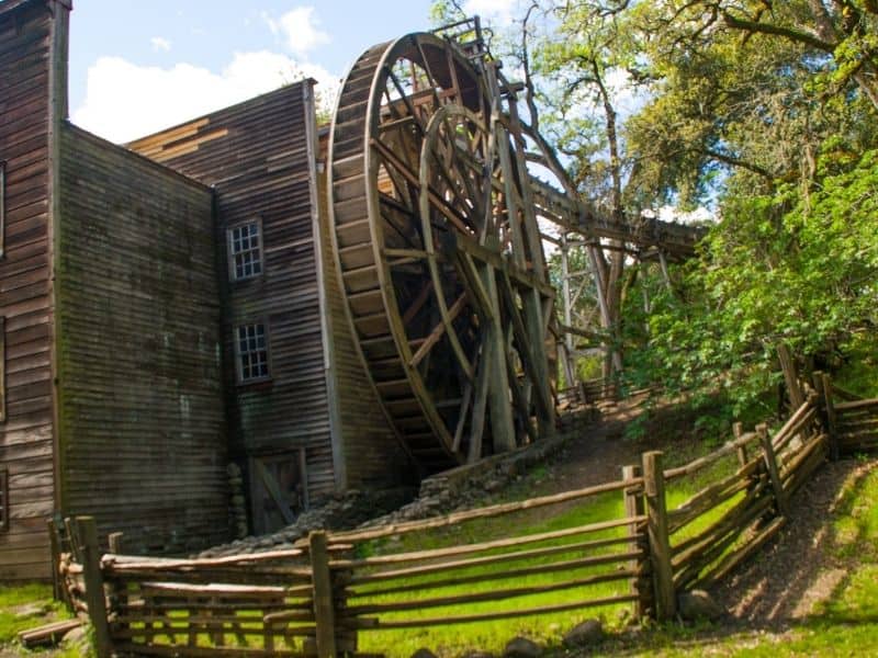 water-powered wheel that mills grist in a park near calistoga