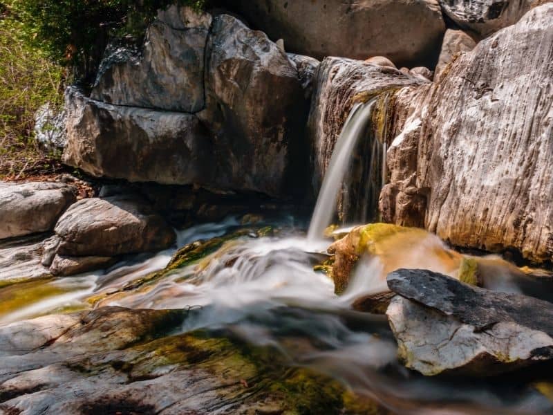 waterfall emptying into a basin in sequoia national park along a popular hike