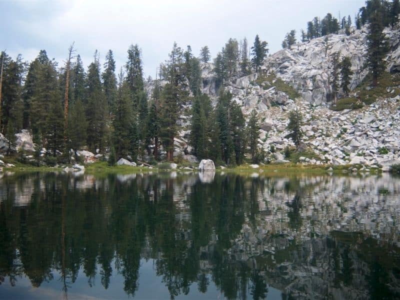 the mirror like waters of the beautiful heather lake a popular hike in sequoia