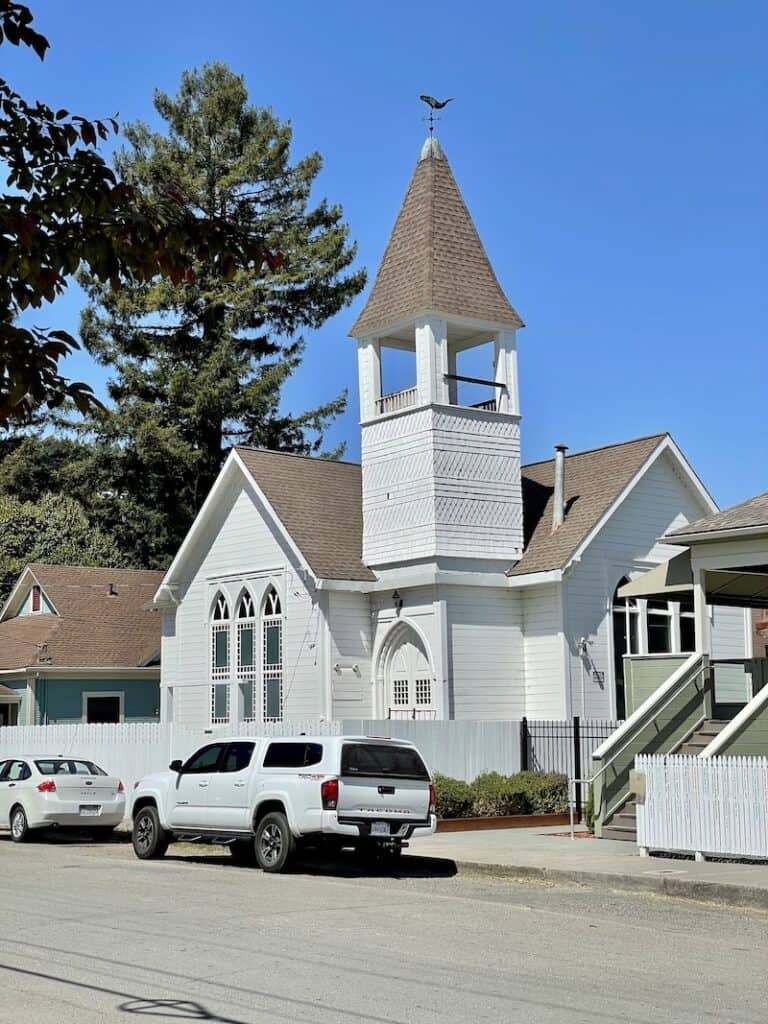 a white victorian-style church