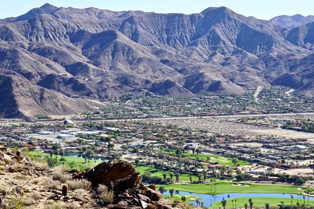 view of Indian Canyon Golf course in Palm Springs from hiking trails in Palm Springs