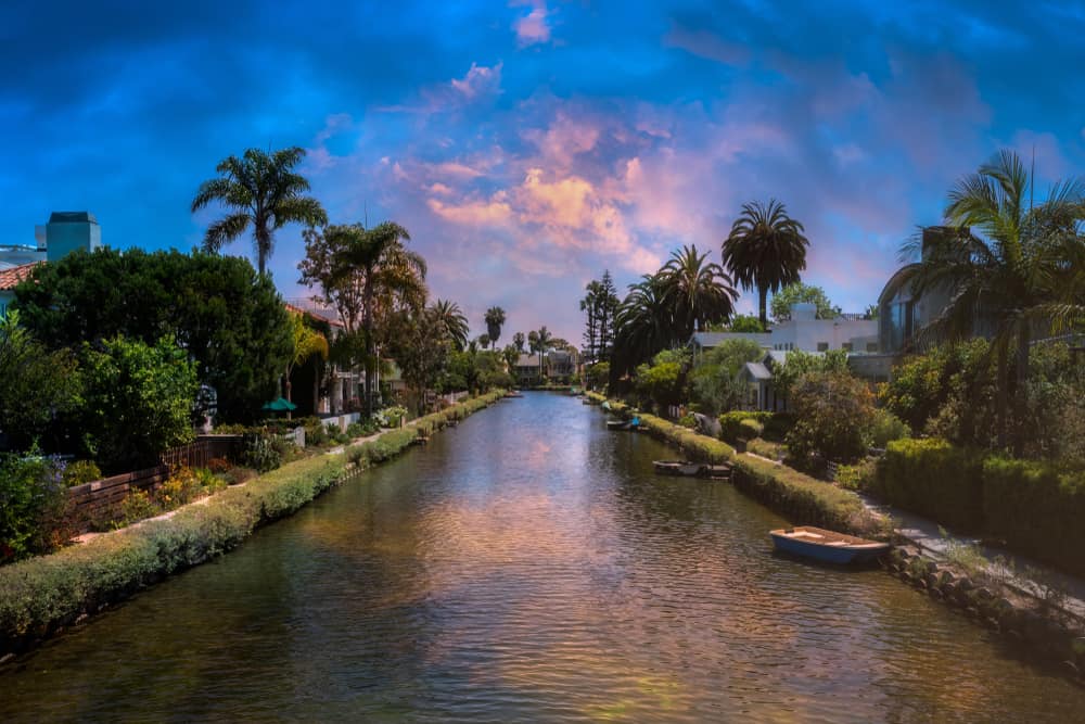 venice canals sunset and palm trees on the canal