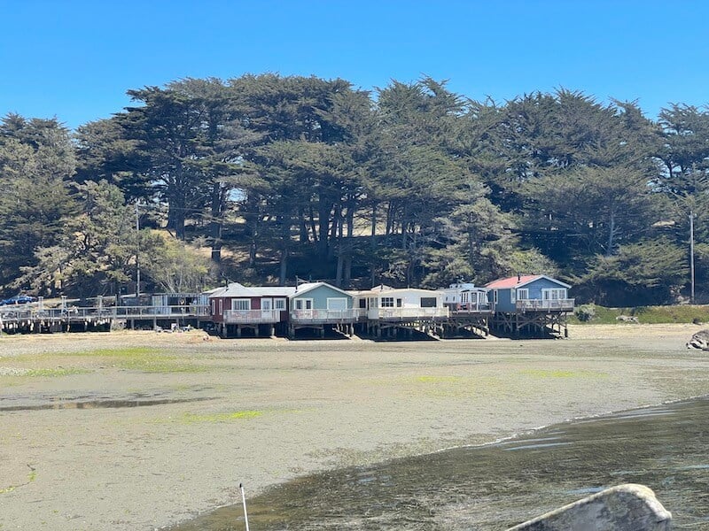 The waterfront cottages at Nick's at low tide