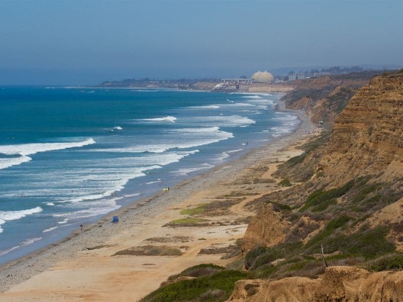 the coastline of san onofre state beach, one of the best places to go camping in orange county