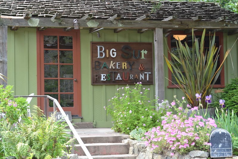 mix and match lettering on a green building that reads 'big sur bakery and restaurant'