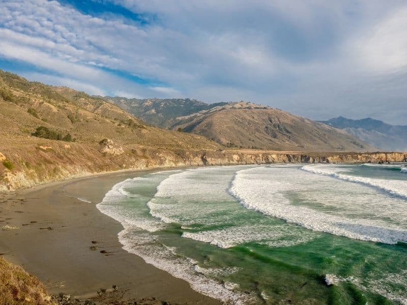 the long sandy beach of sand dollar beach on the big sur coast