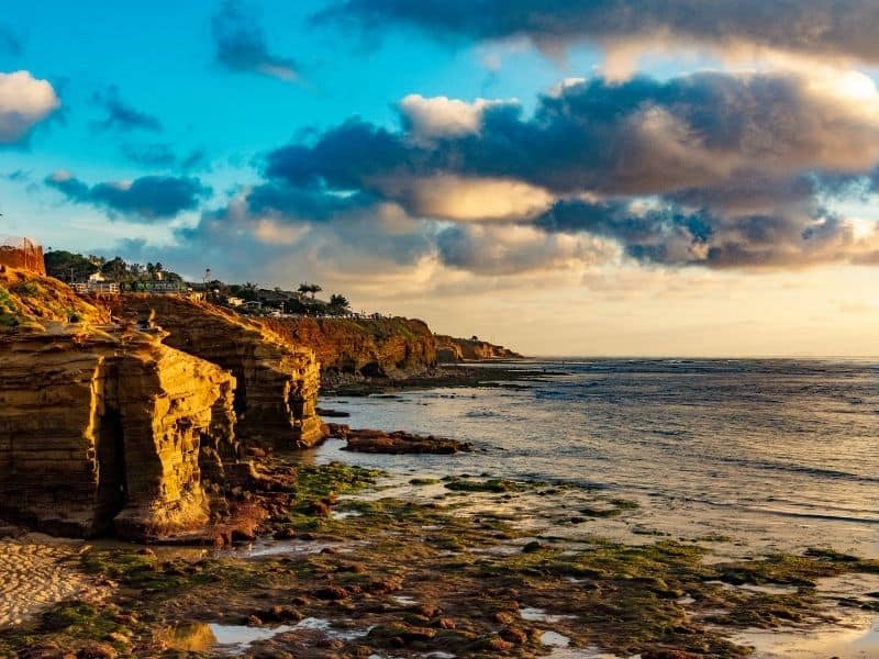 Dramatic orange and blue sunset light at Sunset Cliffs in San Diego, California