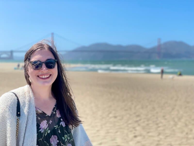 allison posing in front of the golden gate bridge