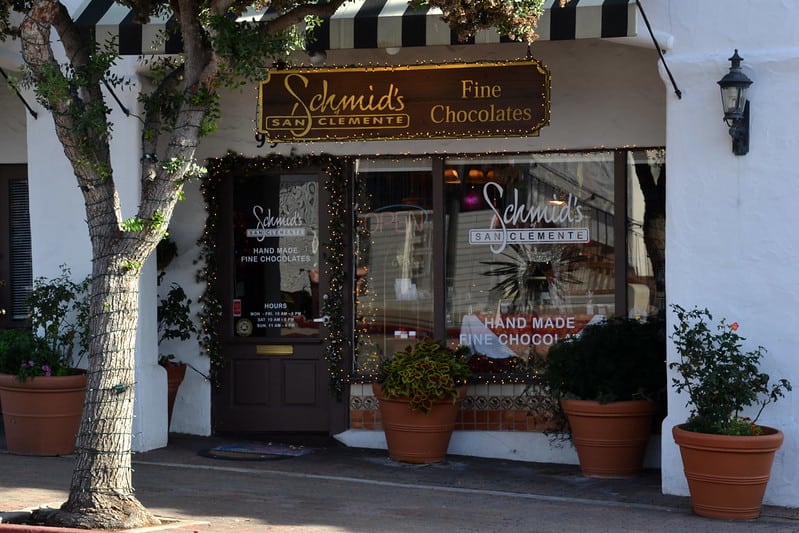 a sign for schmids fine chocolates in san clemente selling hand made fine chocolate