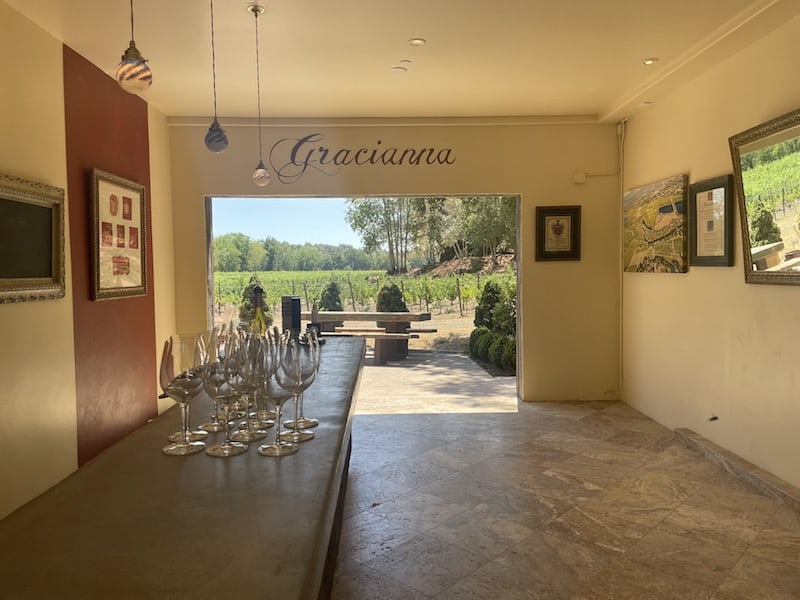 tasting room at gracianna winery with wine glasses cued up for people to come in