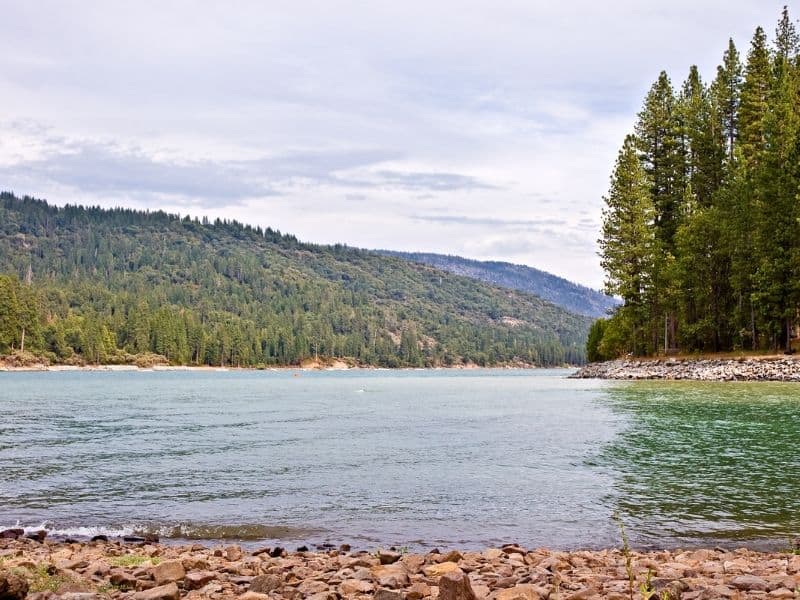 the glassy still waters of bass lake California in the sierra nevada mountains