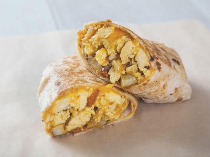 breakfast burrito with egg, potato, onion and meat