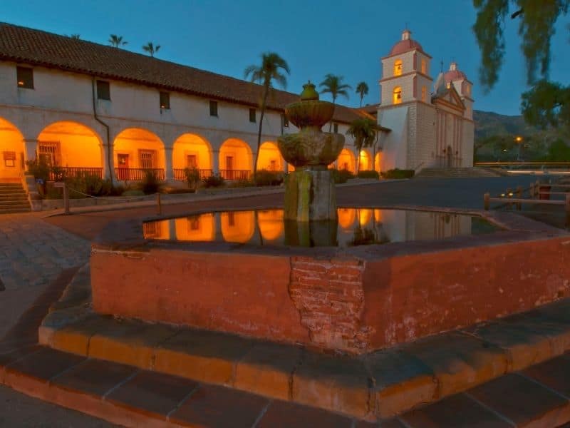 Santa Barbara's traditional spanish styled architecture lit up from within at night