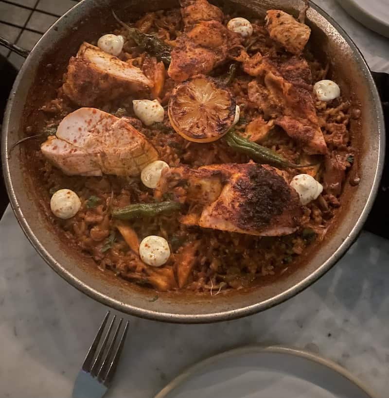 paella with chicken, vegetables and lemon aioli