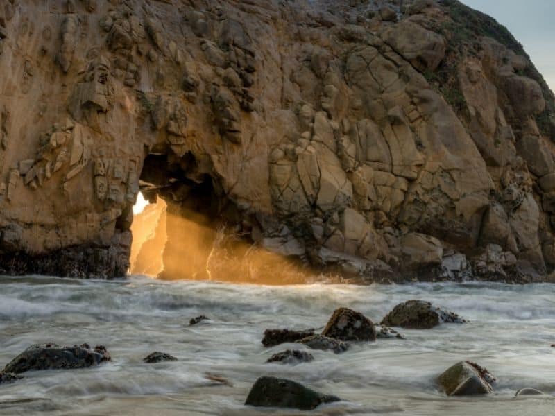 light coming in through the rock arch of keyhole arch