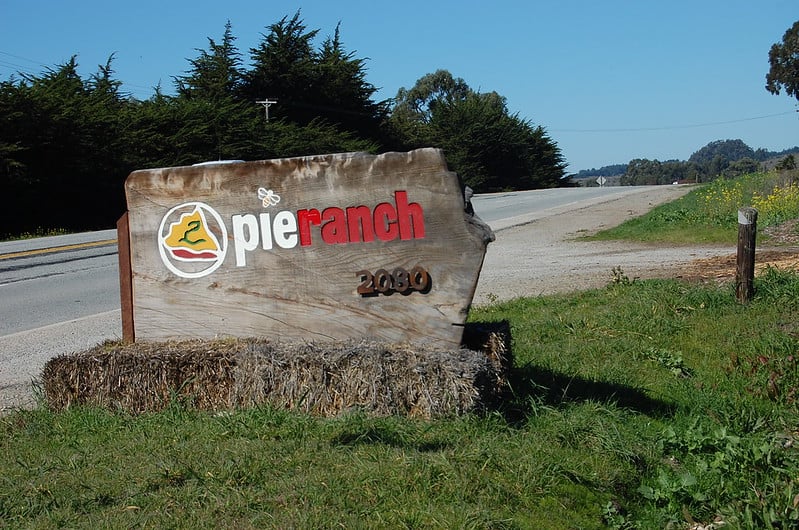sign along the highway reading pie ranch