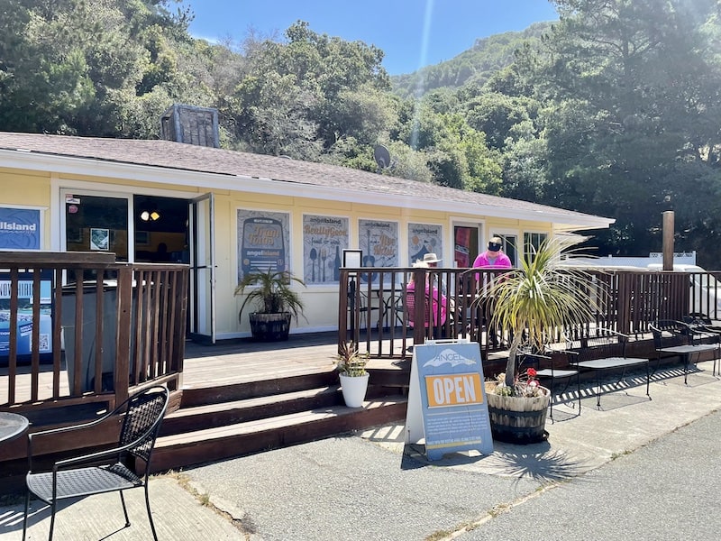 cafe at angel island in a yellow building with outdoor seating available